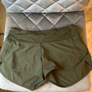 Dark green lululemon speed up low rise shorts Size 2